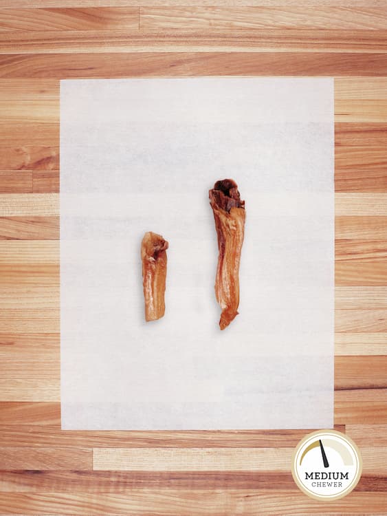 small and large beef hocks on a butcher block countertop