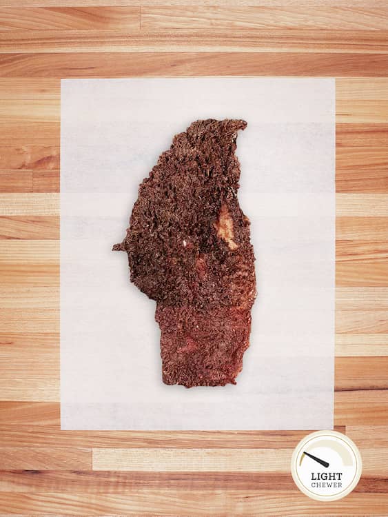 beef tripe on a butcher block countertop