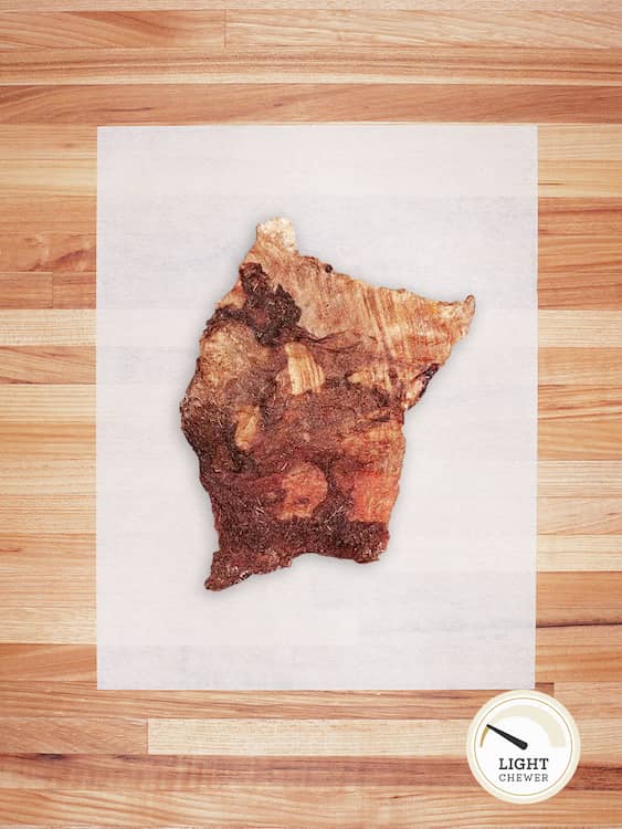 light brown beef tripe on a butcher block countertop