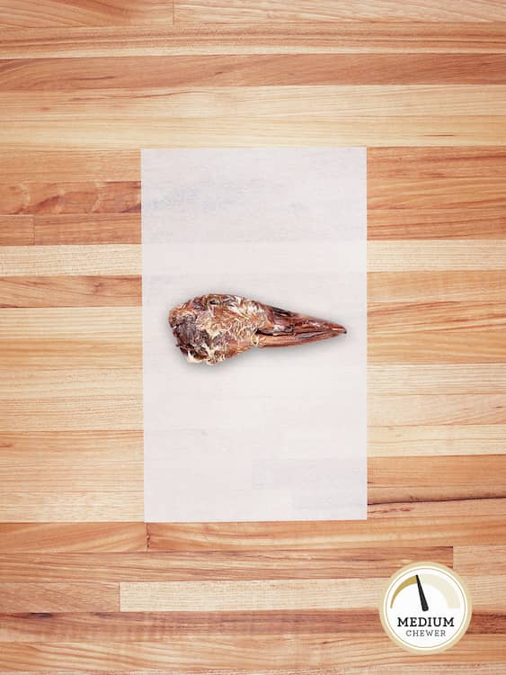 duck head on a butcher block countertop