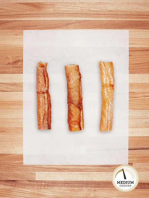 three small hog hide rolls on a butcher block countertop