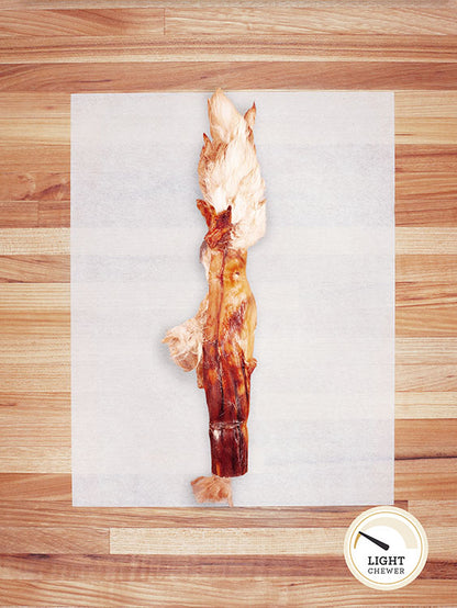 white rabbit hide on a butcher block countertop