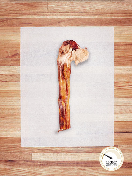 light brown rabbit hide on a butcher block countertop