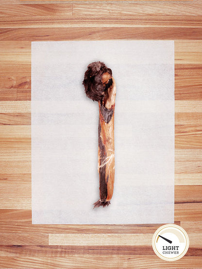 brown rabbit hide on a butcher block countertop