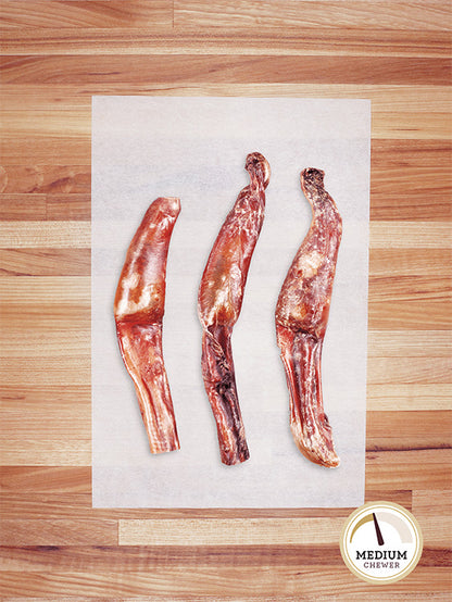 three beef bully tips on a butcher block countertop