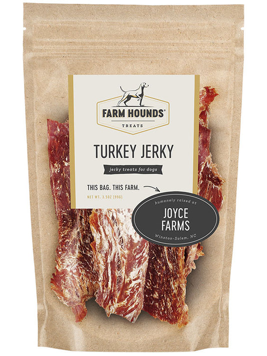 turkey jerky in a sealed kraft paper pouch bag with a clear front and a farm partner sticker